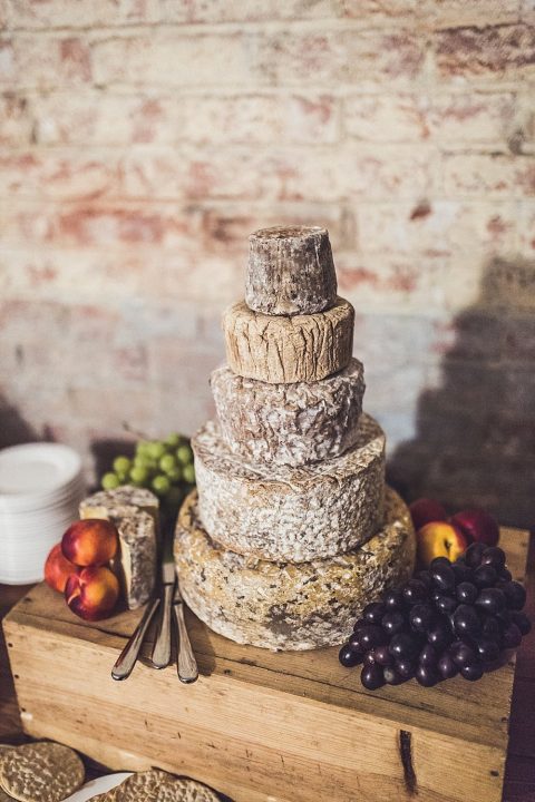 a cheese wheel wedding cake is a very cool idea for any wedding, where the couple doesn’t like sweets much