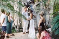 a relaxed beach micro wedding with some guests and the couple’s dog participating is a cool idea