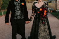 02 The bride was wearing a black lace V-neckline wedding dress with long sleeves, the groom was wearing a black suit and a whimsy shirt