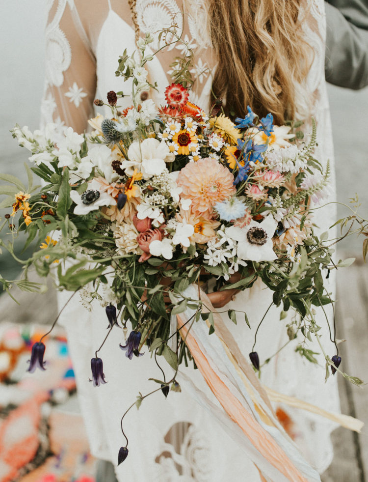 Her bouquet was a wildflower one, with bright and neutral blooms and lots of greenery