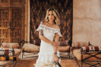 03 The bride was wearing an off the shoulder boho lace wedding dress with a layered necklace