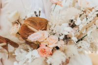 05 The wedding bouquet was done with blush and white blooms, pampas grass and other dried stuff