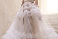 05 a romantic strapless A-line wedding dress wiht a lace embroidered bodice and a tiered tulle skirt wiht polka dots