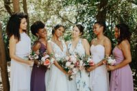 06 The bridesmaids were rocking mismatching white, mauve, purple and floral maxi dresses
