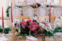 06 The table was styled with an airy runner, bright blooms and greenery, colorful candles and gold touches