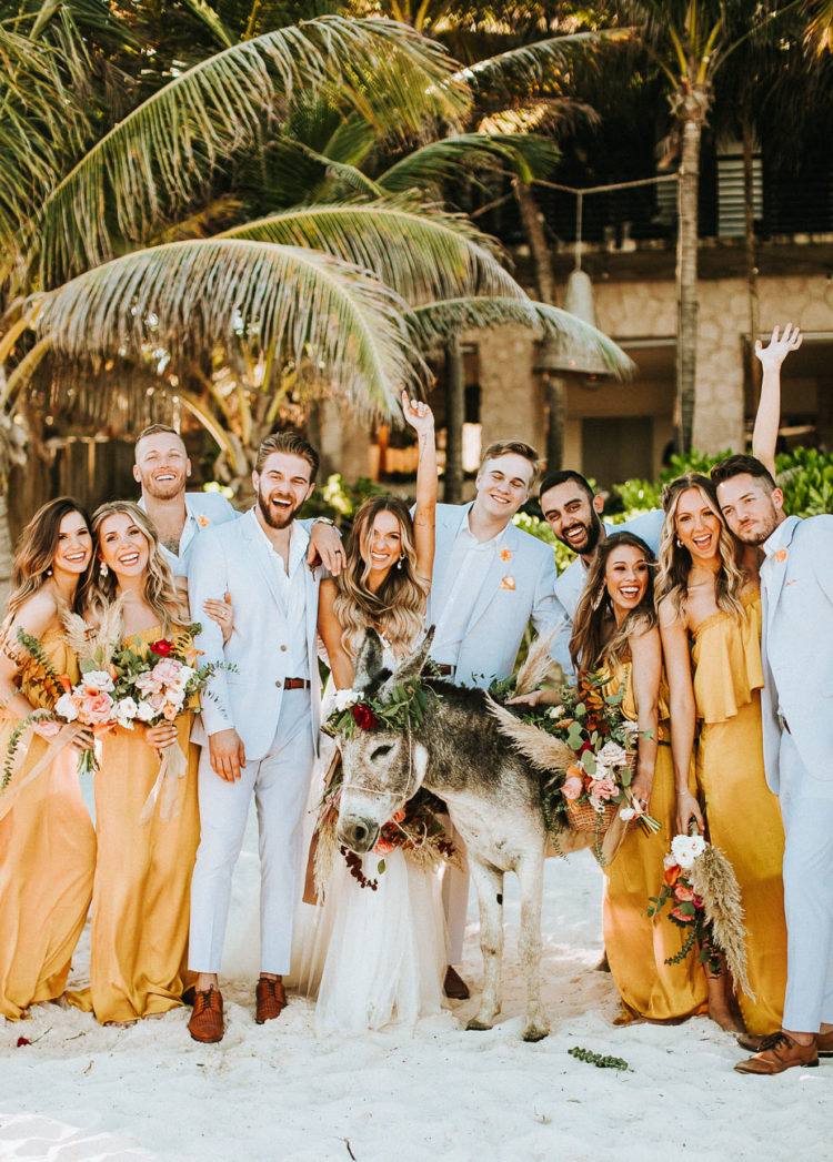 A donkey participated in the wedding, she was dressed up with blooms