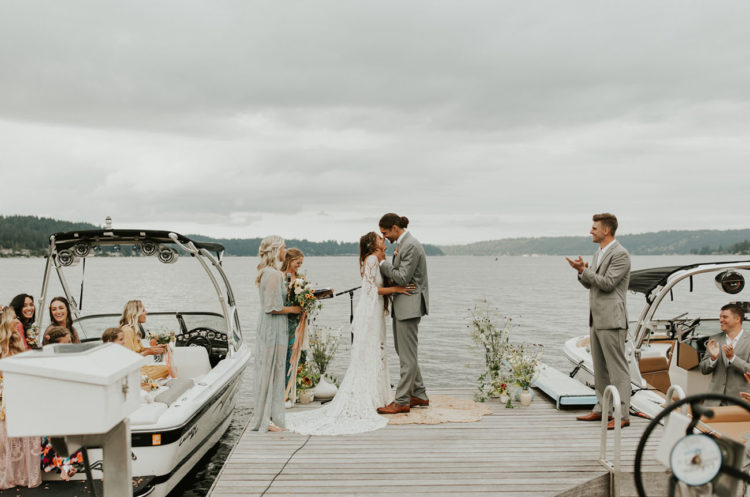 The dock was decorated with boho rugs and widlflower arrangements in vases