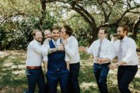 07 The groomsmen were rocking navy pants, white shirts and printed ties