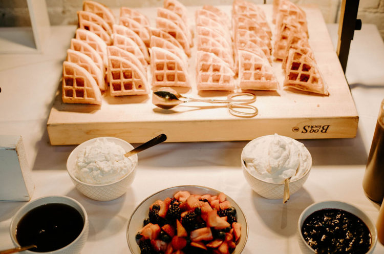 The wedding menu wa done with traditional brunch food like waffles, fruits, dips and eggs and bacon