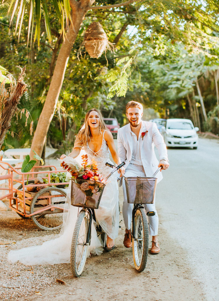 The couple had fun riding bikes for the wedding portraits