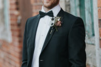 10 The groom changed up for a classic black tux