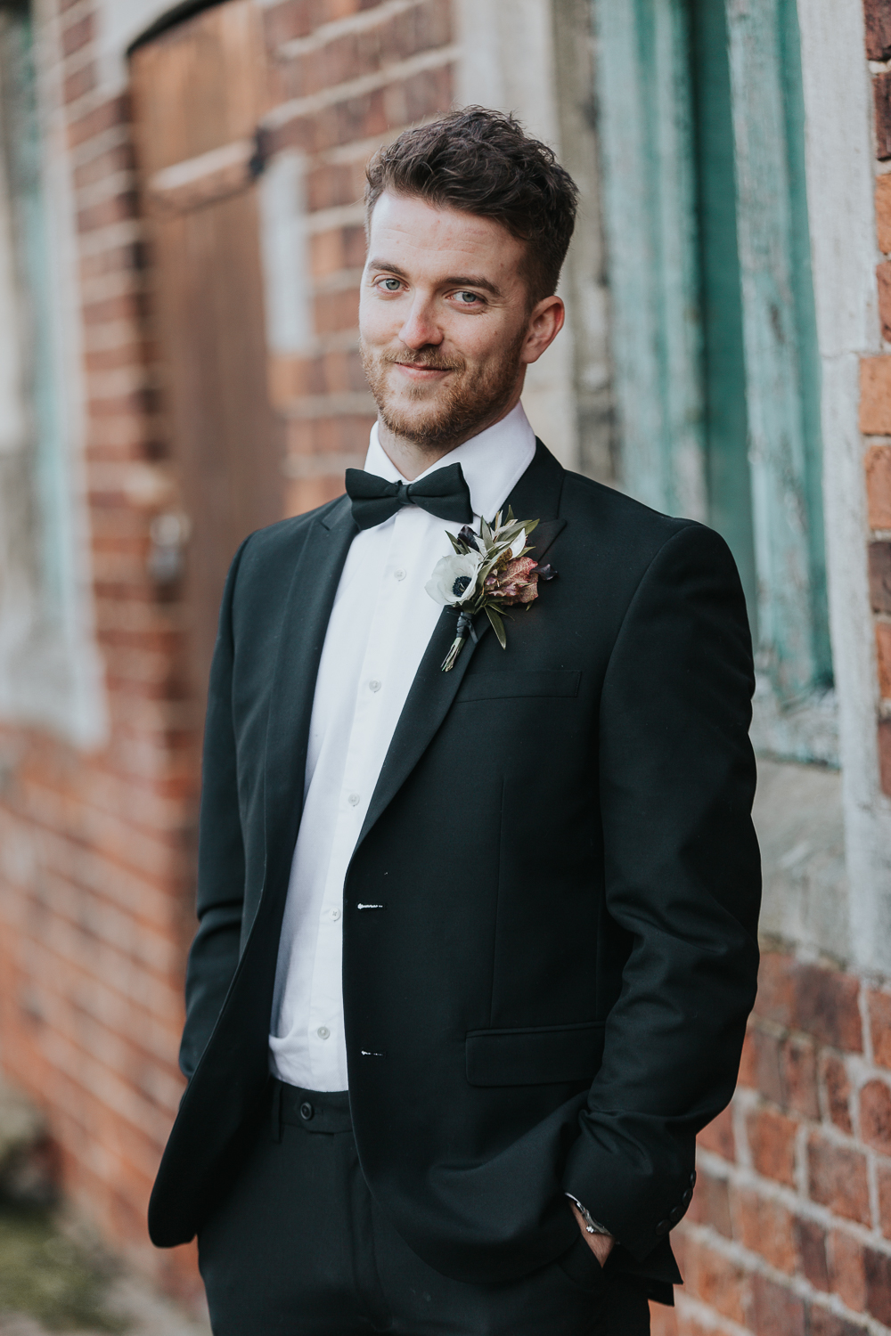 The groom changed up for a classic black tux