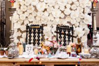 a gorgeous sweetheart table with a bloom backdrop
