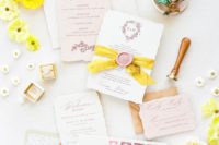10 The wedding invitation suite was done with neutrals, blush and seals and bright ribbons