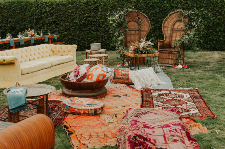 The wedding lounge was a truly boho one, with bright rugs, pillows and lots of wildflowers