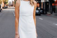 16 a little white knee dress with a high neckline, no sleeves, a front slit for a spring or summer bride-to-be