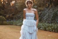 18 a creative light blue wedding dress inspired by antique ones, with a corset bodice on spaghetti straps and a tiered tulle skirt