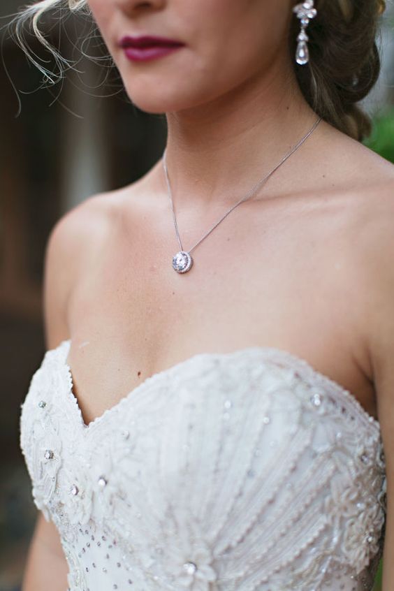 a beautiful vintage statement crystal necklace to highlight the sweetheart neckline and embellished bodice