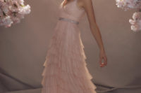 22 a romantic pink wedding dress with ruffle straps and a necklace, a tiered tulle skirt and an embellished sash