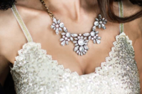 23 a statement vintage gold necklace with rhinestone flowers is a bold accessory for a bride with a vintage feel