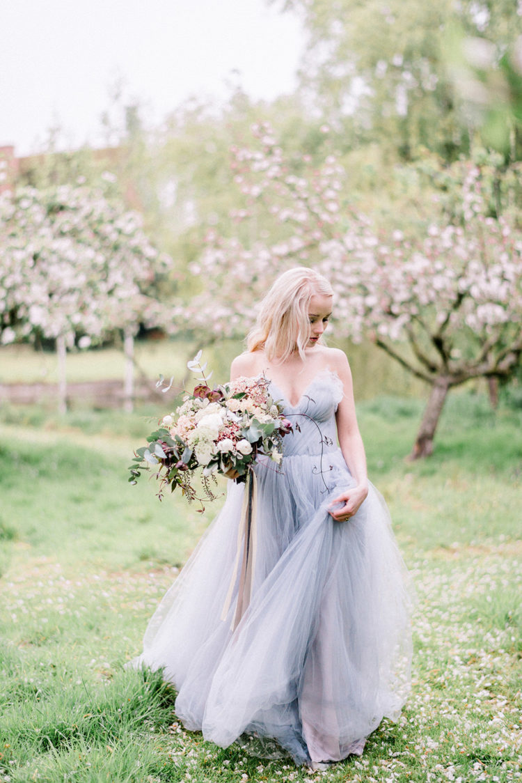 a strapless blue tulel wedding gown is a very romantic and chic idea for every bride
