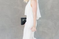 a chic and casual bridal shower outfit with a crop top and high waisted pants, nude shoes and a small black bag