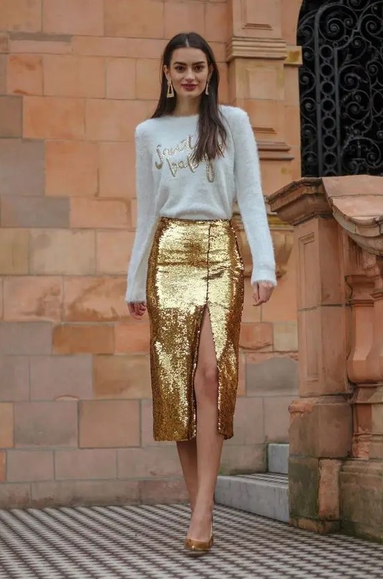 a gold sequin pencil midi skirt with a front slit is a fabulous piece to wear with a neutral top and gold shoes