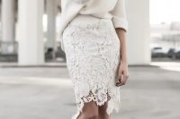 a lovely and feminine bridal shower outfit with an off white oversized knit, an off white laser cut lace pencil skirt and blush heels