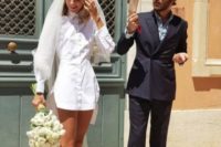 a mini wedding shirtdress, red flats, a veil for a bold and non-traditional look at your wedding