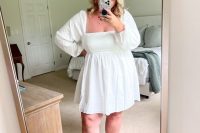a pretty knee white dress with a square neckline and long sleeves will be a nice idea for a spring or summer bridal shower