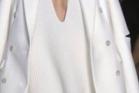 a white pencil skirt, an oversized plunging neckline chunky knit sweater and a white coat for a sexy look