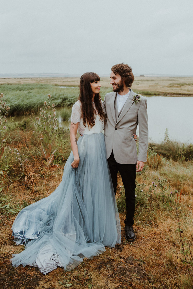 This couple went for a simple and laid back wedding with touches of blue inspired by the wedding dress