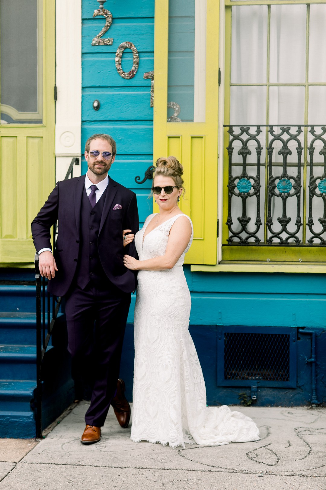 This funky wedding took place in New Orleans and was done with glitter, feathers and bright colors