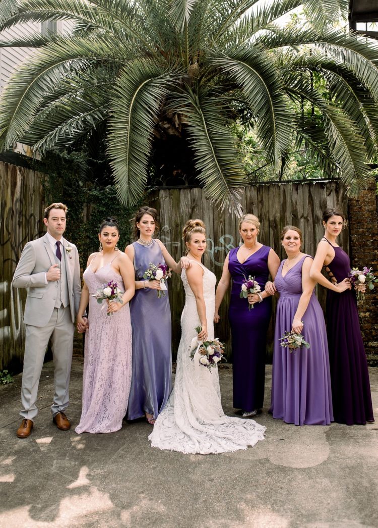 The bridesmaids were wearing lilac, blush and purple dresses, mismatching and all maxi