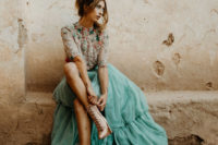 04 The bride was rocking a gorgeous fully embellished crop top and a turquoise tiered tulle skirt plus pink satin booties