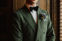 a gorgeous green groom’s suit