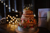 05 The wedding cake was a naked one decorated with fresh fruits and blooms