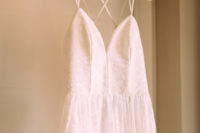 05 hang your wedding dress correctly using ribbons that are inside your wedding dress