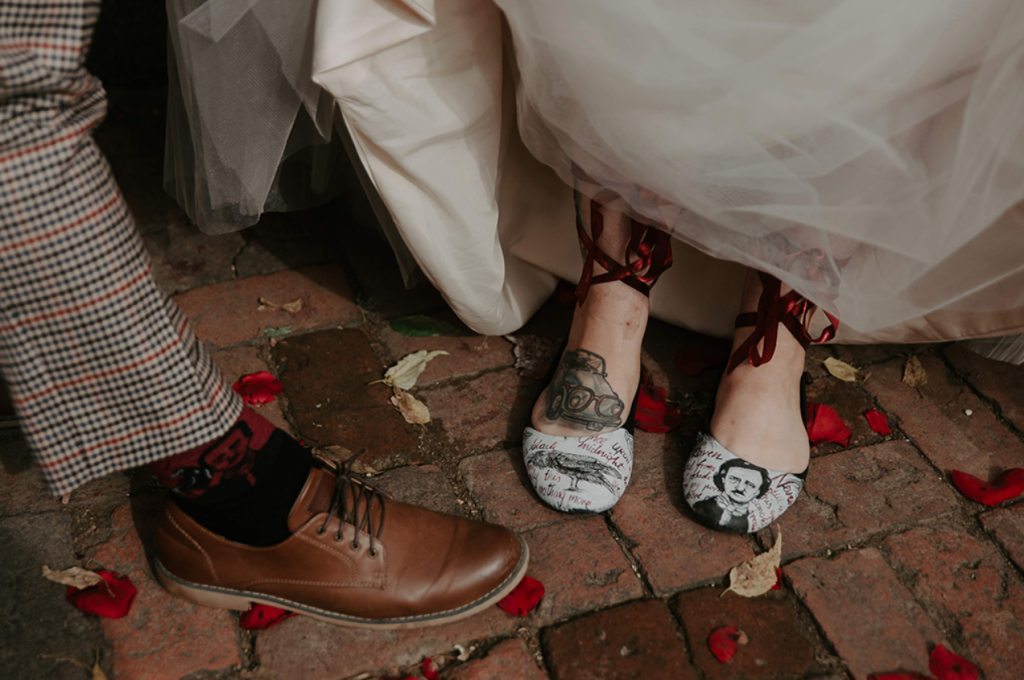 The bride was wearing Edgar Allan Poe shoes and the groom was wearing such socks
