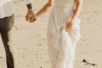 10 an off the shoulder boho lace beach wedding dress with a deep cut is a chic idea to rock