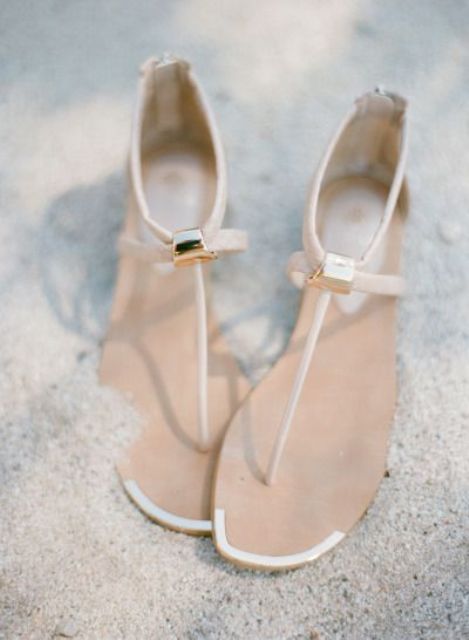 minimalist flat sandals with slight gold touches look chic and stylish and can be worn after the wedding
