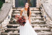 a dark leaf and burgundy smoke bush to contrast the neutral wedding dress and stand out a lot as much as possible