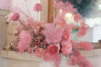 sprayed smoke bush and some blooms for an unusual and bold wedding arrangement that inspires