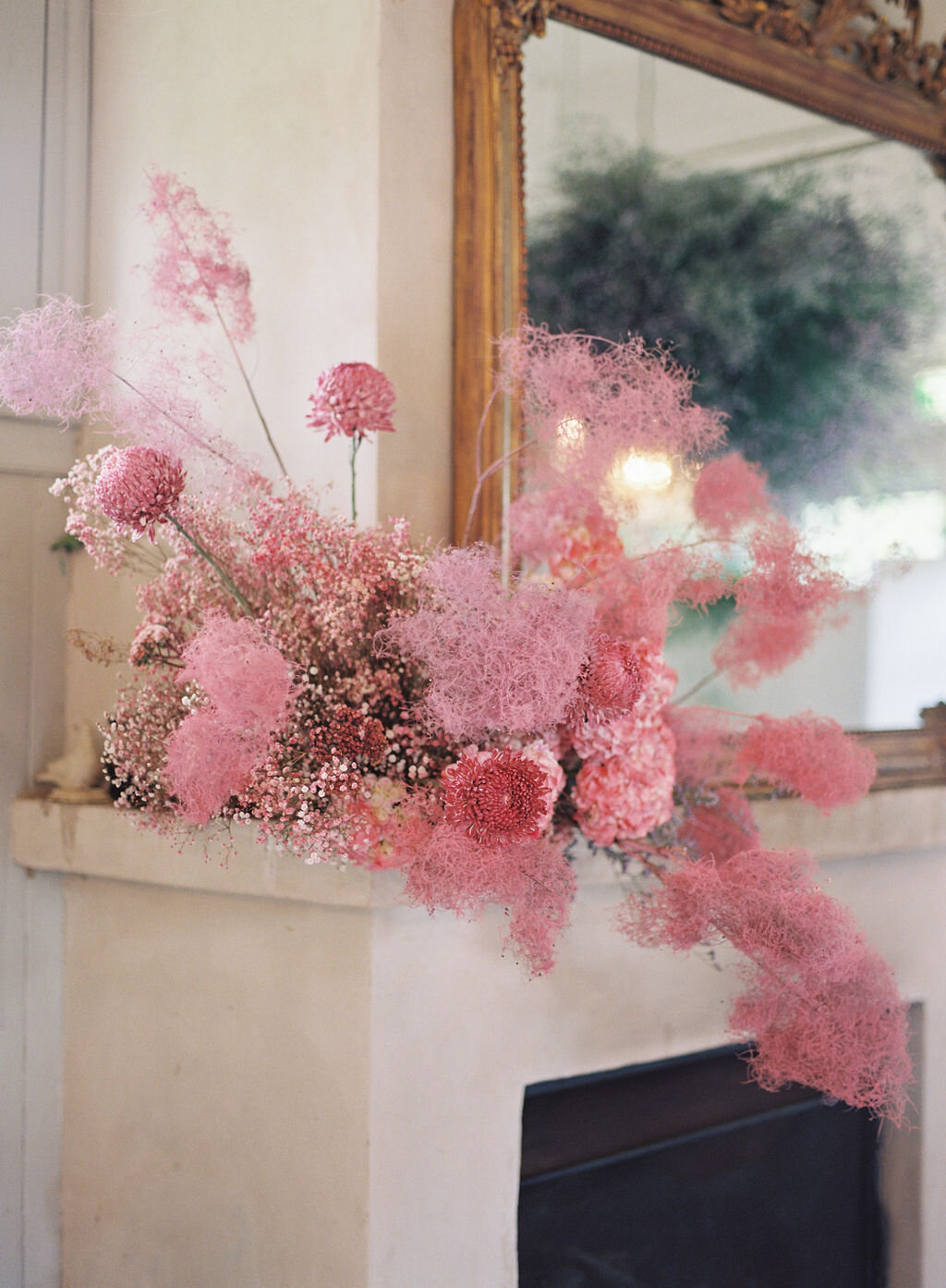 Sprayed smoke bush and some blooms for an unusual and bold wedding arrangement that inspires