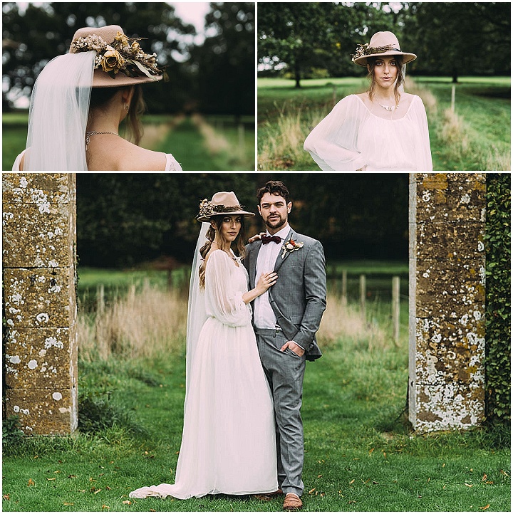 The bride was wearing a romantic layered wedding dress with short sleeves, a scoop neckline and a hat with a veil