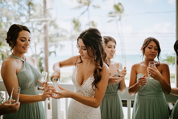 The bridesmaids were wearing mismatching mint maxi gowns