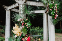 a tropical-inspired wedding altar