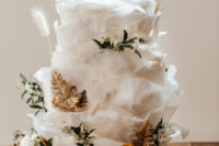 09 I’m in love with this gorgeous wedding cake with lots of layers and gilded leaves, it looks incredible