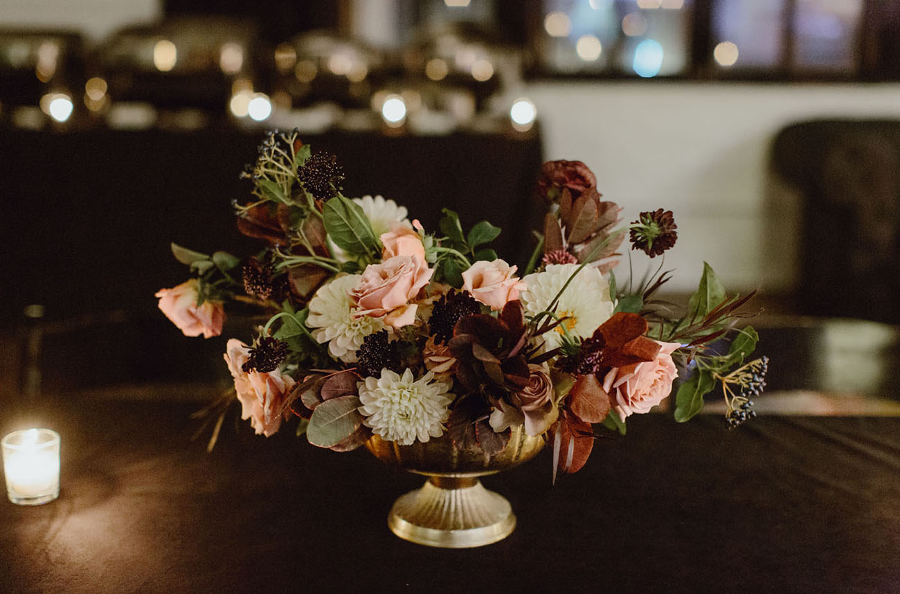 The centerpieces were elegant and moody and reminded of the bouquet