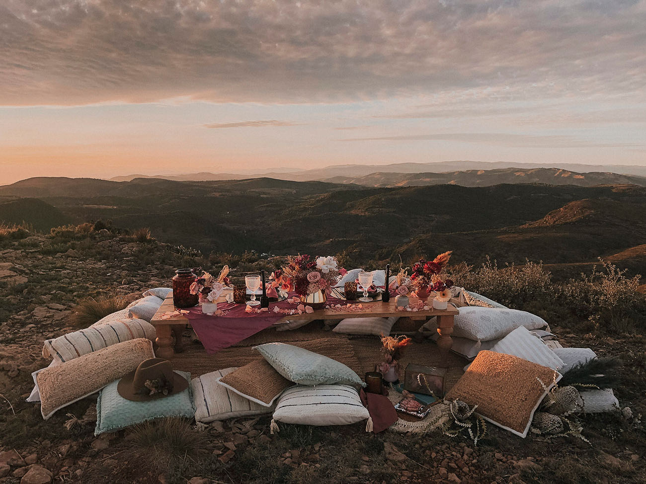 The wedding reception was boho, styled as a cozy picnic